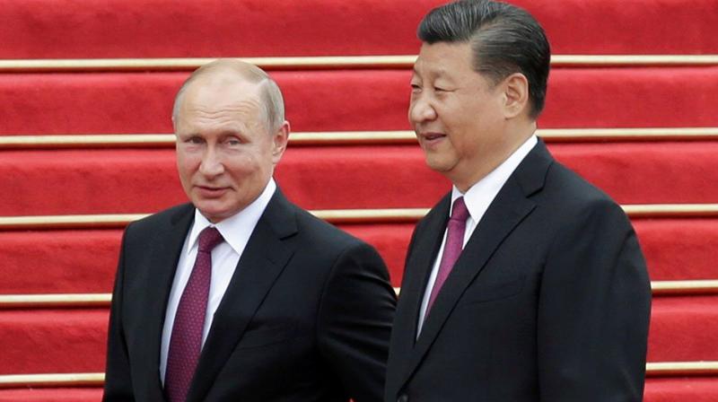Xi, Putin meet as US tensions brings them closer