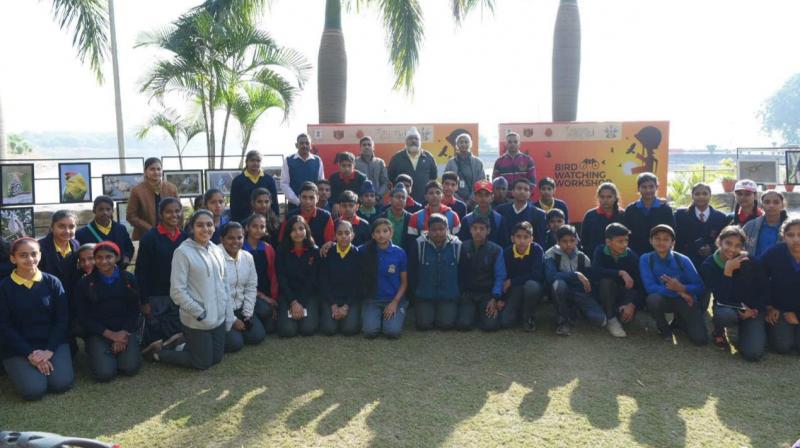Participants pose for a group photo during the BirdWatching Workshop organised in run up to the MLF at the Lake Club