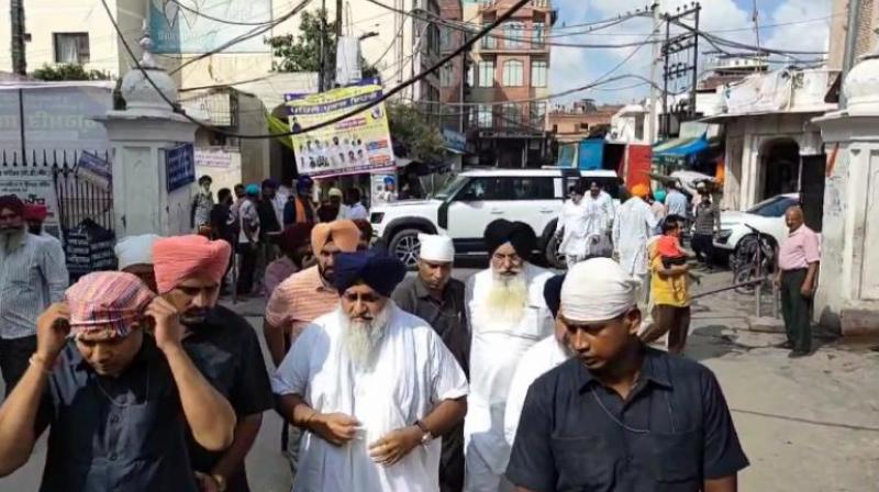 Days after being declared 'Tankhaiya', Sukhbir Badal appears before Sri Akal Takht Sahib 