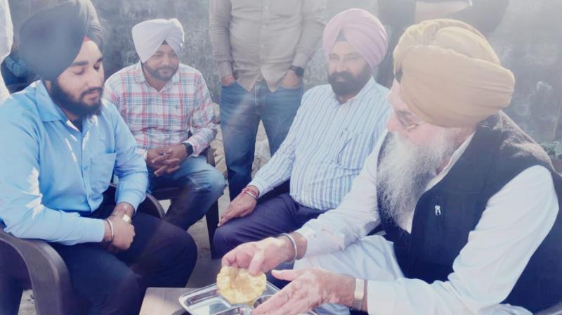 Sardar Kultar Singh Sandhwan explaining important points to student Jagmander Singh, who will play the role of Speaker Punjab Vidhan Sabha in the student session.    Learning Governance Through Role-Play: Punjab Govt Holds Special Student Session
