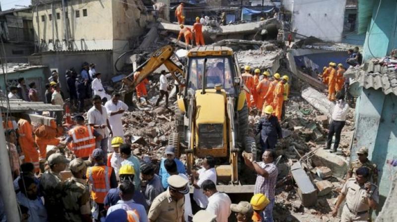 1 killed, 2 injured in wall collapse