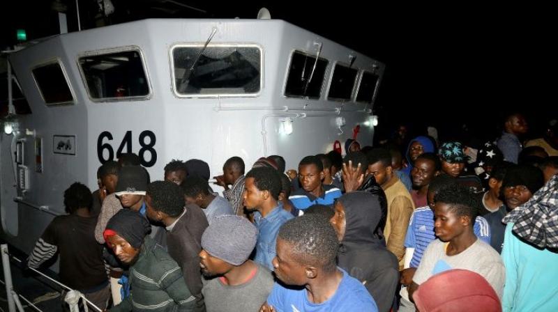 Nearly 1,000 migrants rescued off