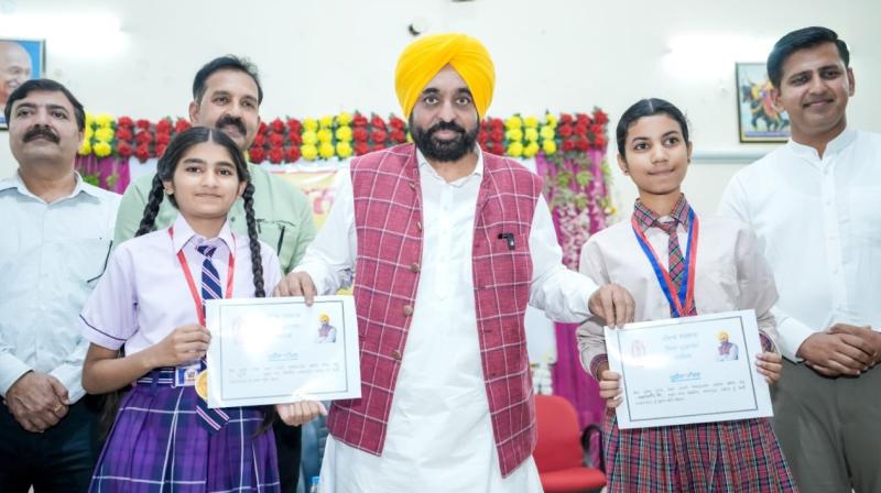 CM Bhagwant Singh Mann interacts with students at School of Eminence in Adampur; Schools of Eminence are catalysts giving wings to students' dreams File Photo.