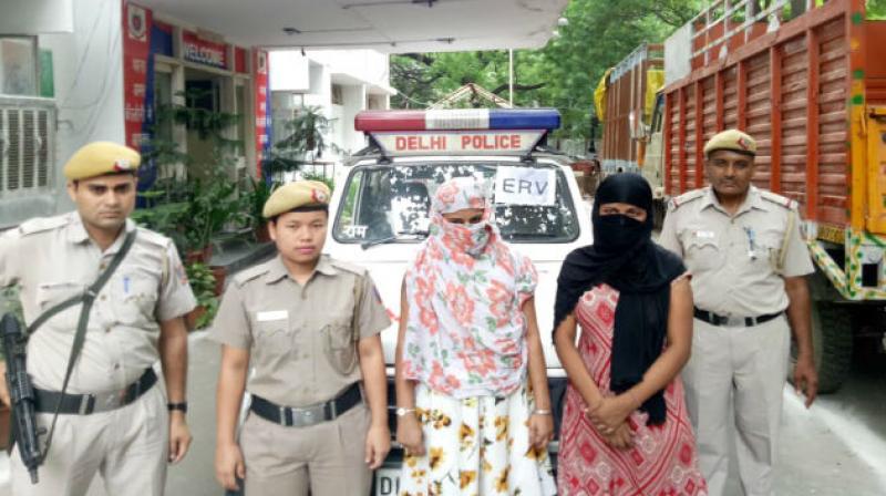 Two women held for robing men on pretext of seeking help