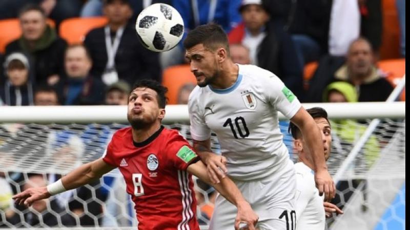 Uruguay strike late to beat Egypt as Salah sits out match