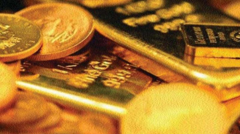 Gold ends lower on tepid demand