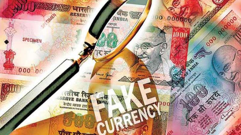 Bank manager booked over fake notes