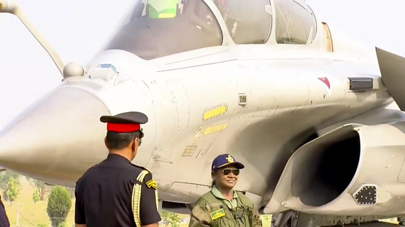 President Droupadi Murmu with Chief of the Air Staff Air Chief Marshal AP Singh, second from left, and others before she takes a sortie in Rafale fighter jet, at Air Force Station in Haryana's Ambala. (Source, Image Courtesy: PTI)