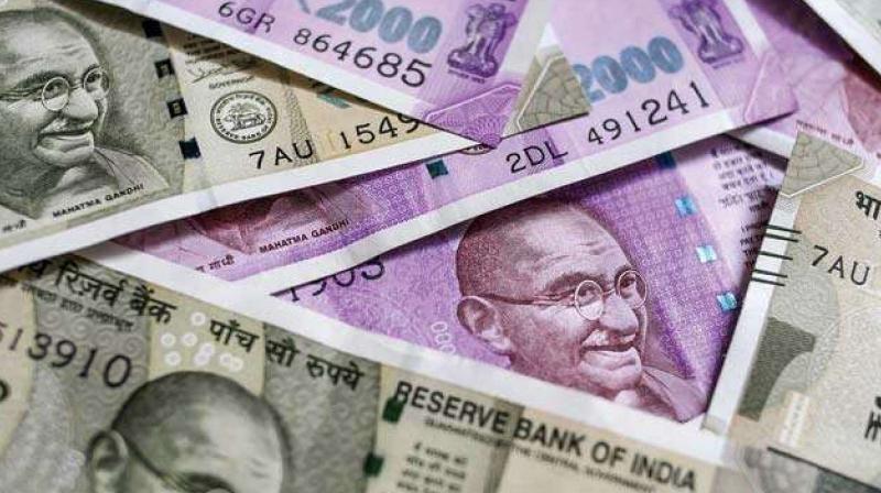Rupee gains 26 paise 