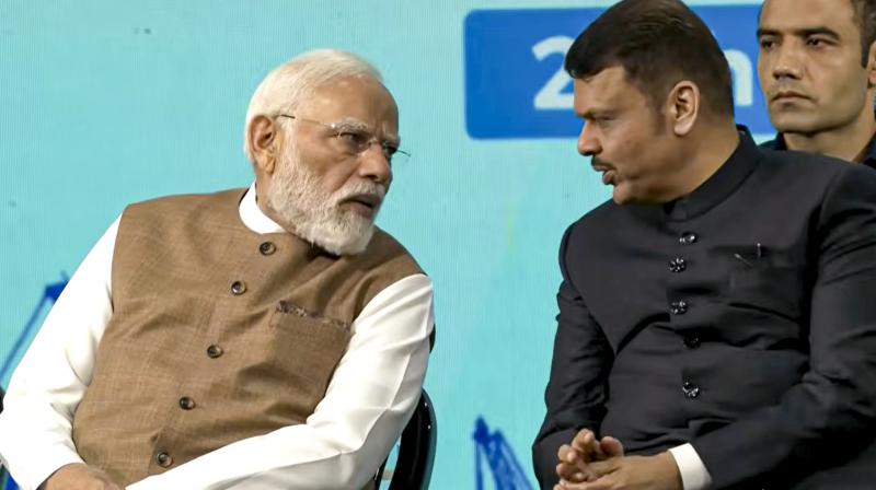 Prime Minister Narendra Modi in a conversation with Maharashtra Chief Minister Devendra Fadnavis during the Maritime Leaders Conclave, in Mumbai.