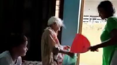 Woman beating mother in law