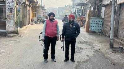 Tired of extortion threats, shopkeepers hire private security guards (Photo Courtesy: The Tribune)