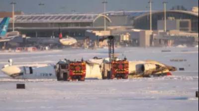 Delta plane flips during landing at Toronto airport; all 80 onboard escape alive 
