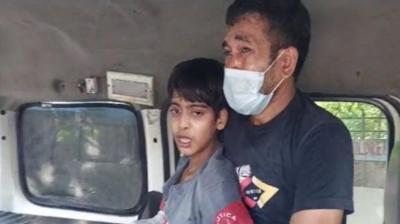 14-year-old Shahvaz with father 