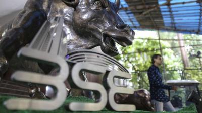BSE Sensex surrendered early gains to end modestly higher