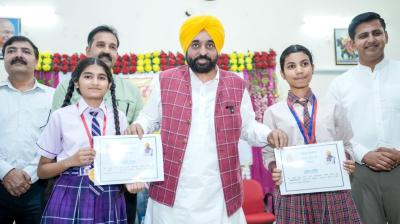 CM Bhagwant Singh Mann interacts with students at School of Eminence in Adampur; Schools of Eminence are catalysts giving wings to students' dreams File Photo.
