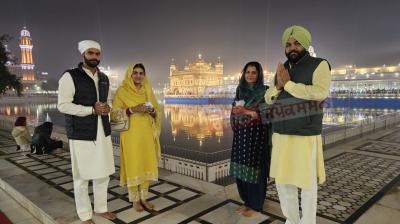 MP Gurjeet Aujla with his newly married daughter & son-in-law at Golden Temple