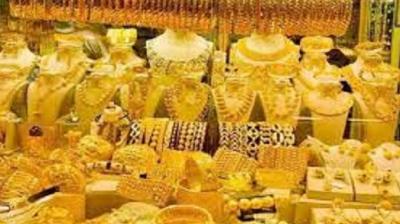 Gold stays weak on global cues, low demand