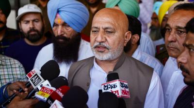 AAP Punjab Media Head Baltej Pannu meets injured anti-drug crusader at Ludhiana on Wednesday File Photo.