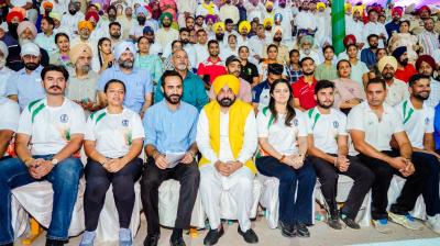 CM Bhagwant Mann with Sports Minister Gurmeet Singh Meet Hayer 