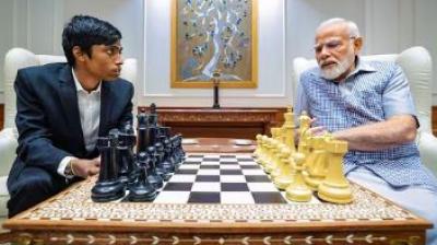 PM Modi with Chess Star R Praggnanandhaa