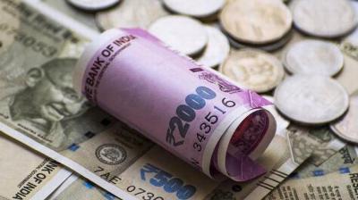 Rupee slips 15 paise