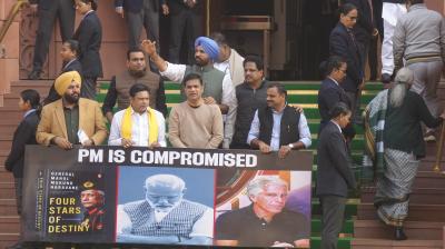 Congress MPs hold poster reading ‘PM is compromised' over India–US trade deal
