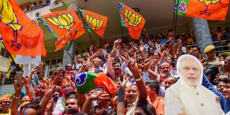 BJP workers celebrate the party's lead in Karnataka Assembly Election 