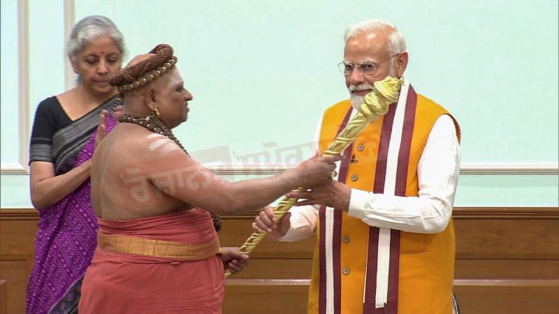 Chief Mahant of Madurai Adheenam Temple, Adheenam Harihar Das Swamigal hands over 'Sengol' to PM Modi which will be installed in the New Parliament Building  
