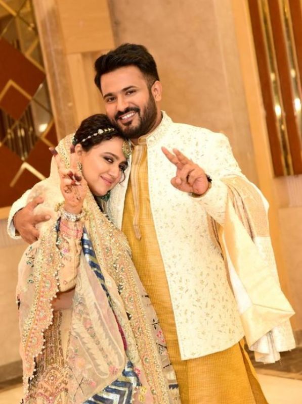 Couple hosted another wedding reception for their family on Sunday
