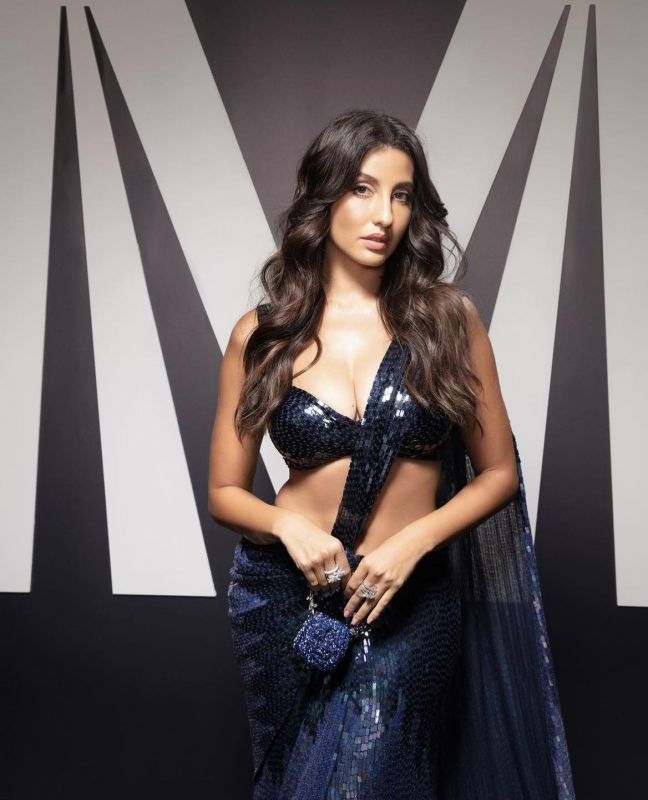Nora Fatehi's Show-Stopping Saree Look Shines at the Manish Malhotra Fashion Extravaganza
