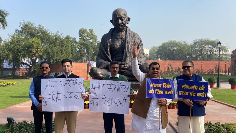 AAP Protests at Parliament's Mahatma Gandhi Statue Against Manish Sisodia & Sanjay Singh's Arrests
