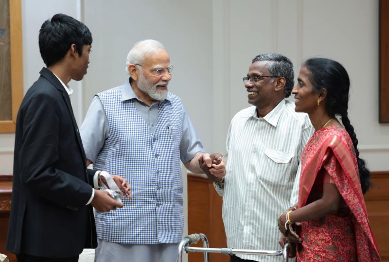 PM Modi Meets Chess Champion R Praggnanandhaa who won Silver Medal in FIDE World Cup 2023