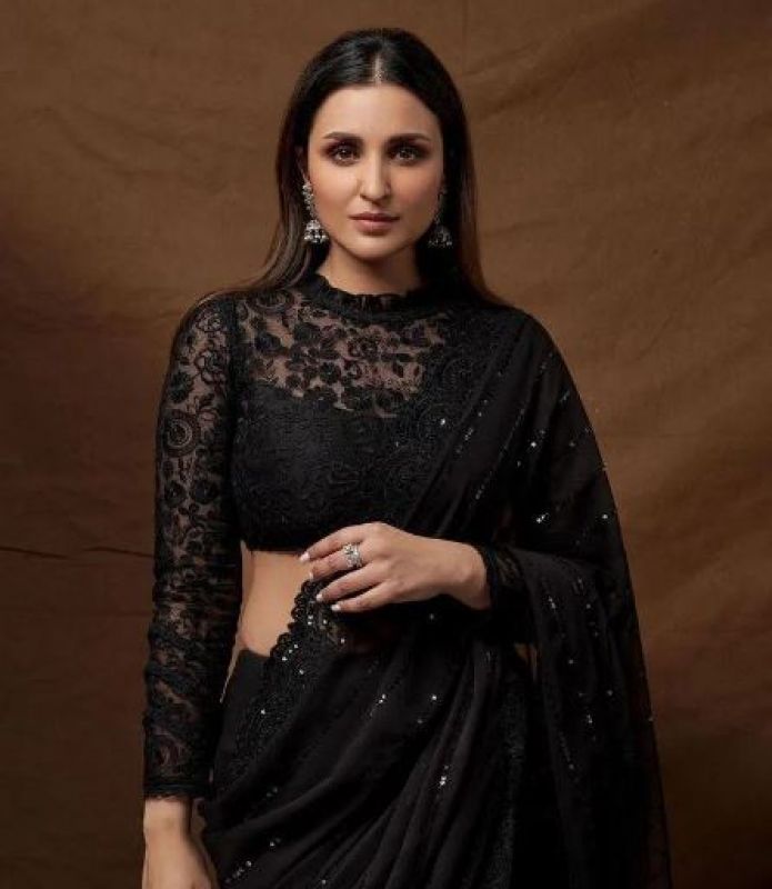 Parineeti Chopra donning black sequin saree 
