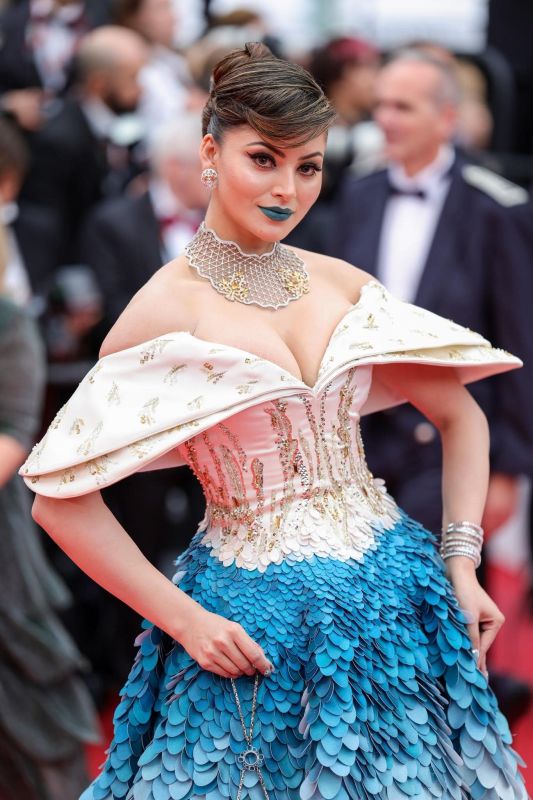 Urvashi Rautela Charms in a Cream-Blue Gown with Blue Lipstick at Cannes 2023, Look Reminds Fans of Aishwarya Rai
