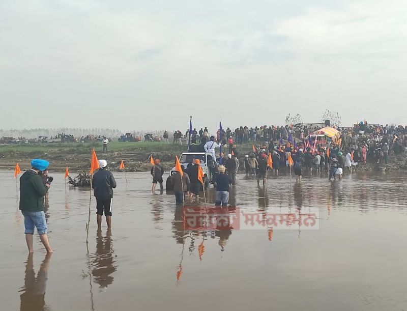 Devotees Cross Sarsa River with Reverent Chants of "Satnam Sri Waheguru"
