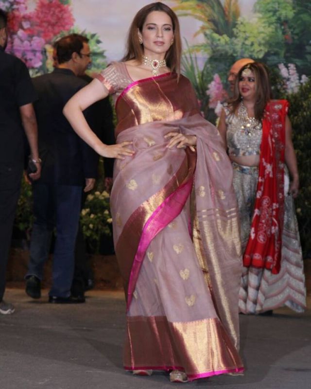 Sonamkapoor and anandahuja at wedding reception