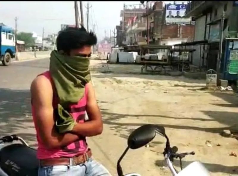 Deoria Police Man Forced To Cover His Face With Shirt Up