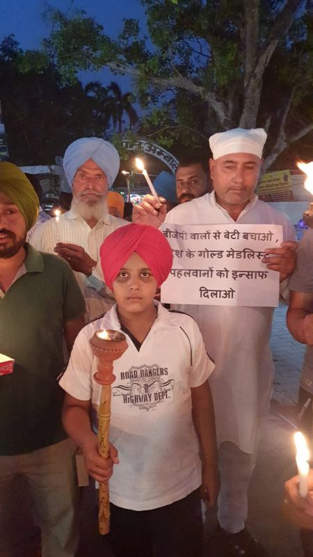 Members of BKU Shaheed Bhagat Singh organized a torch march at the historic Jagadhri Gate of Ambala in support of wrestlers