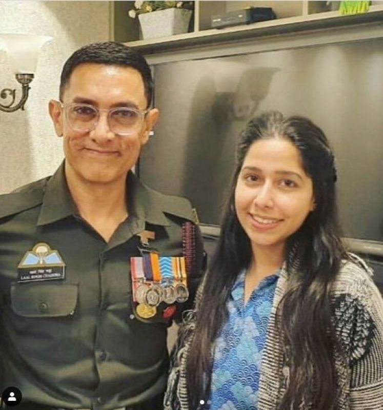 Aamir Khan seen wearing a uniform in clean shave 
