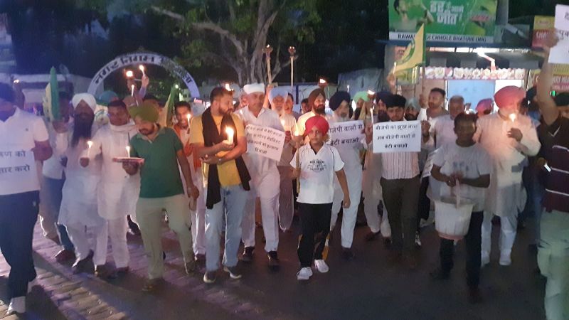 Members of BKU Shaheed Bhagat Singh organized a torch march at the historic Jagadhri Gate of Ambala in support of wrestlers