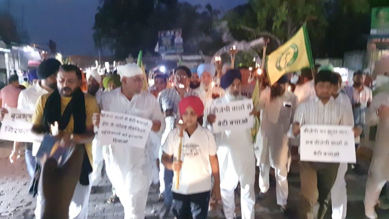 Members of BKU Shaheed Bhagat Singh organized a torch march at the historic Jagadhri Gate of Ambala in support of wrestlers