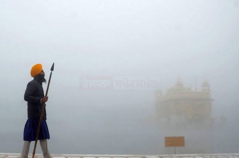 Golden Temple Embraced by Fog Blanket, Unveiling a Serene Spectacle
