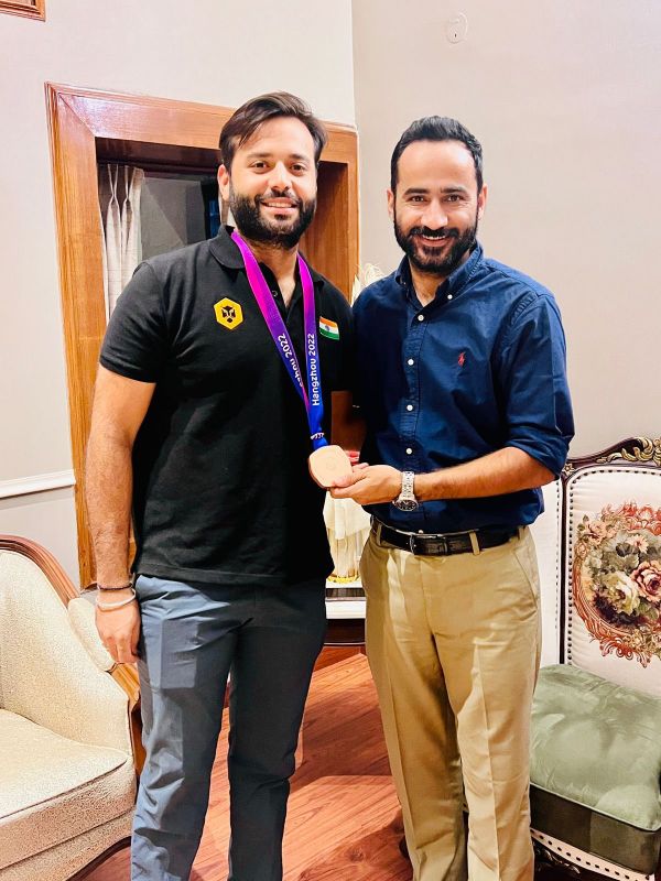 Sports Minister Gurmeet Singh Meet Hayer meets Harmanpreet Kaur, the captain of the Indian women's cricket team which won gold in Asian Games and bronze medalist shooter Gurjoat Singh Khangura
