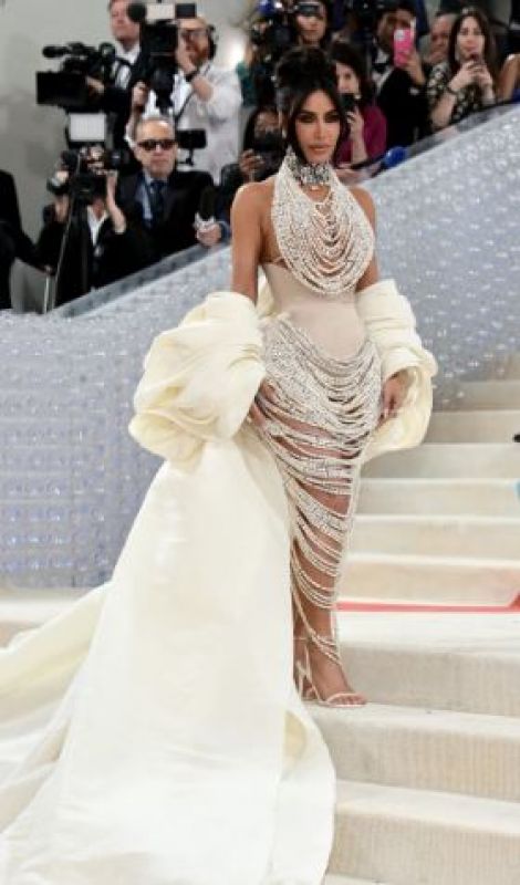 American model, media personality, and businesswoman Kim Kardashian wears pearl naked dress at Met Gala 2023
